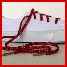 side white sneaker converse with red shoe laces